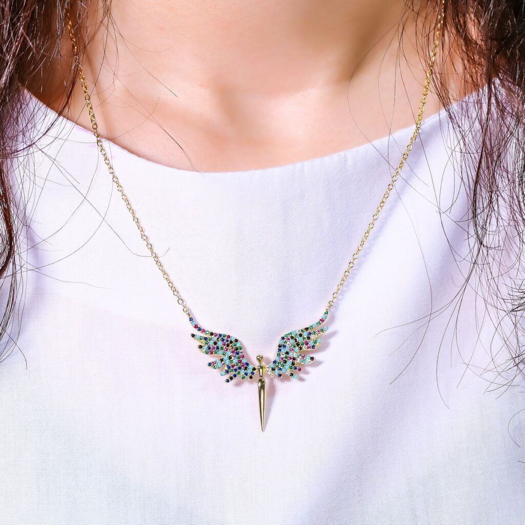 Doji Angel Wings Necklace on model